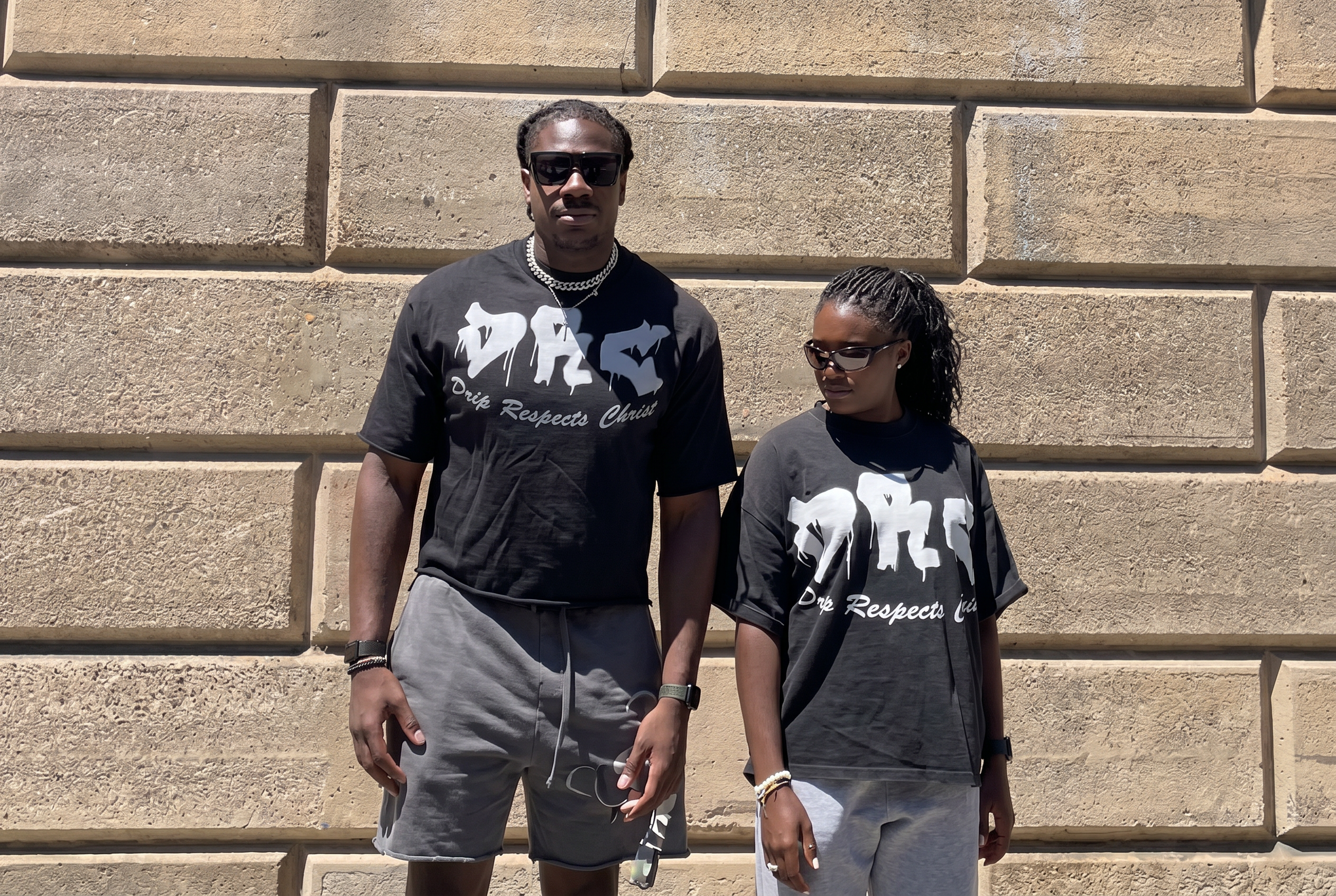 DRC — Drip Respects Christ on a concrete wall